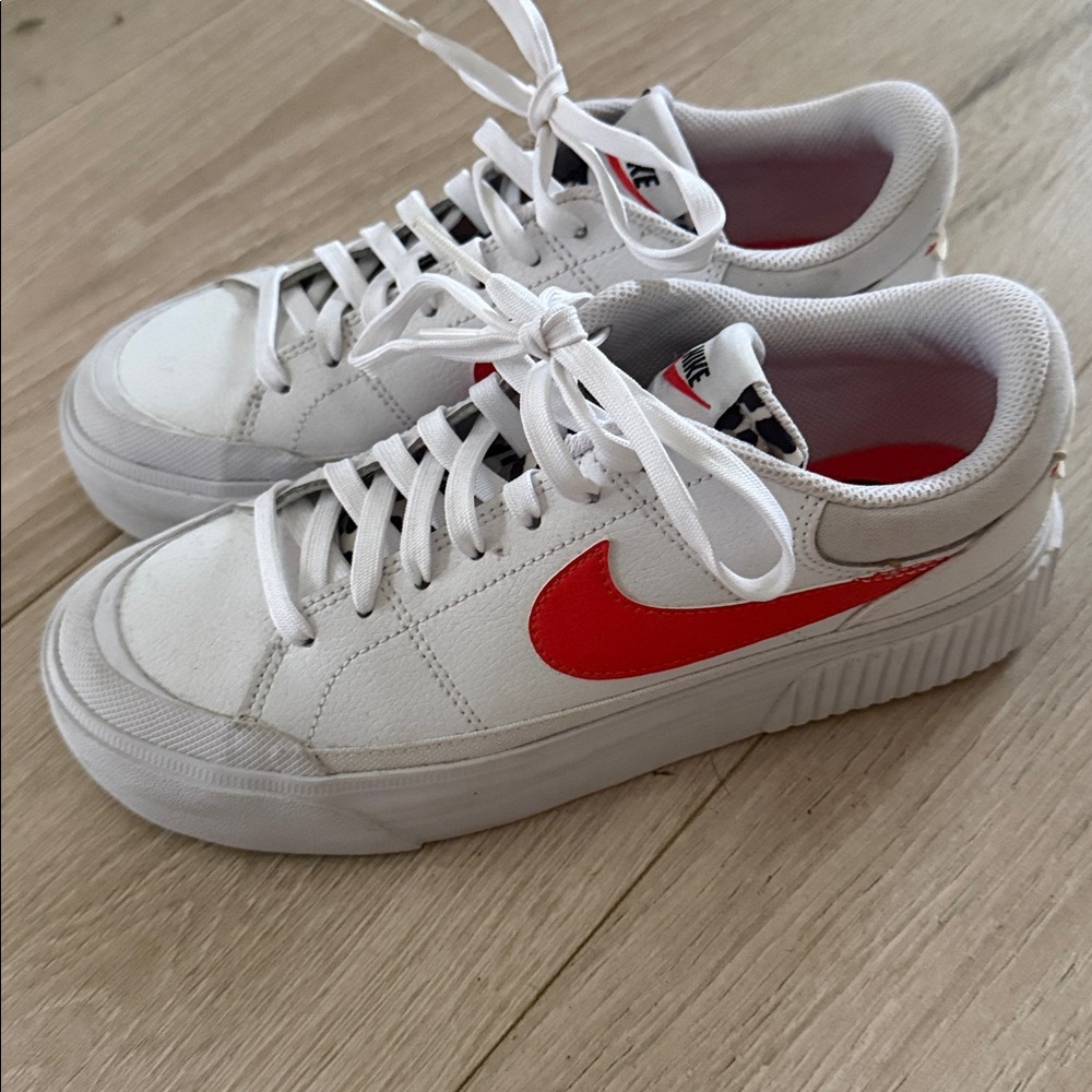 Nike White Sneakers with Red Swoosh